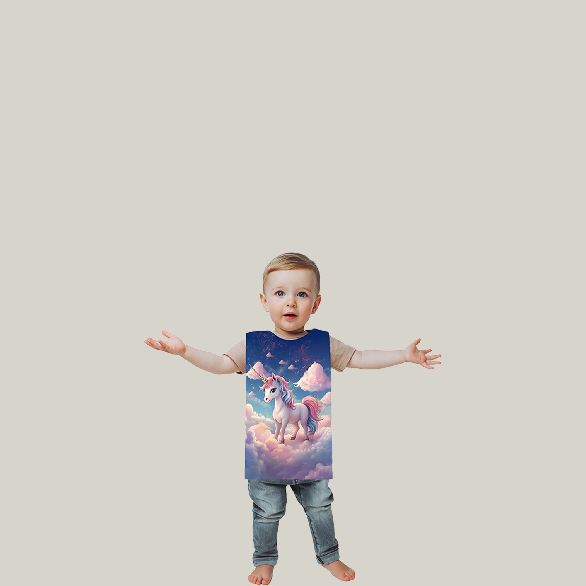 Toddler boy wearing a tabard with a dreamy, fantasy-inspired design featuring a gentle white unicorn standing on soft, fluffy clouds. The unicorn has a long golden horn and a flowing mane and tail in pastel shades of pink, purple, and blue. It is set against a magical sky that fades from warm sunset tones near the horizon into a deep, star-speckled night sky above. Light, cotton-candy clouds float around, with tiny sparkles scattered across the scene, giving it a calm, whimsical, and enchanting feel. The overall colour palette is soft and soothing, with glowing highlights that make the unicorn appear almost magical and serene.